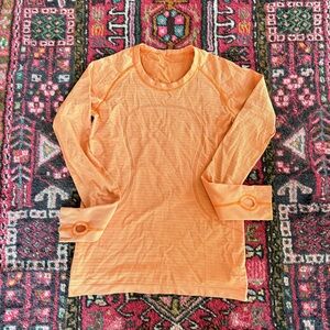 Euc lululemon athletica Orange Long Sleeve swiftly thumb holes size 8